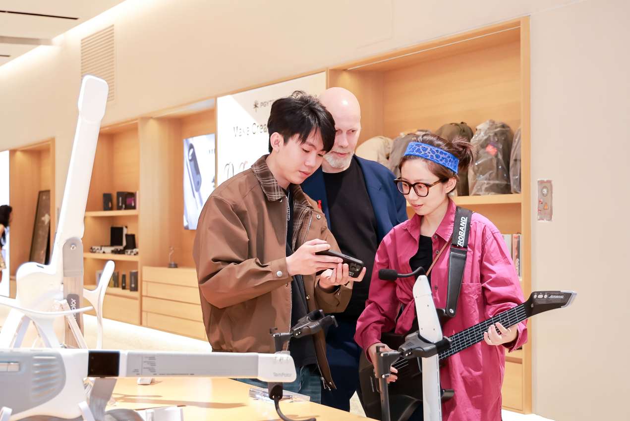Visitors exploring innovative consumer technology products at the INNO100 flagship store